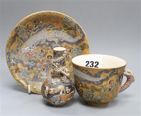 A Japanese Satsuma bottle vase and a cup and saucer